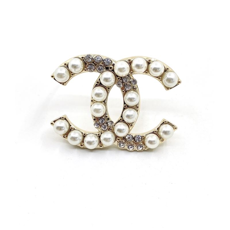 Ch*el brooches